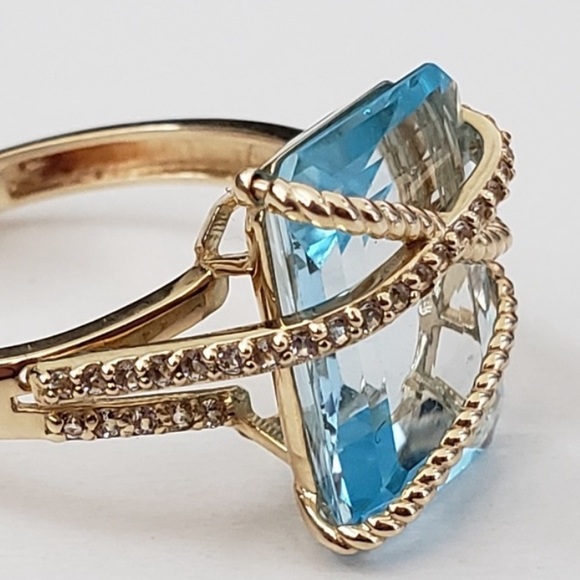 Sky Blue Topaz and Diamond Crisscross Ring in 14kt Yellow Gold. - Picture 3 of 8